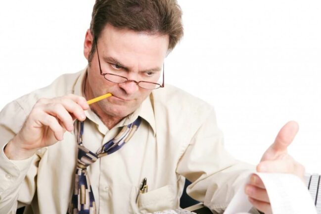 man doing calculations